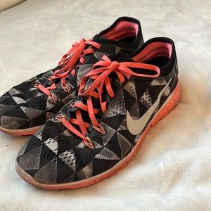 Nike running and training shoes size 9, pink and black .